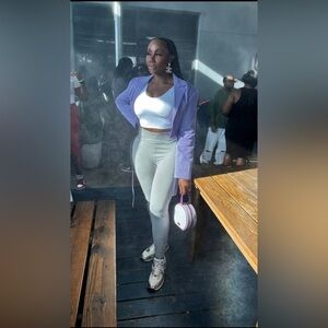 Lilac blazer and gray leggings